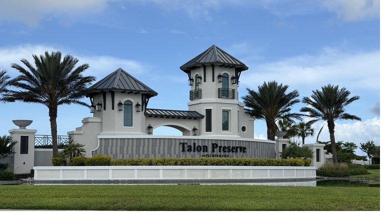 Talon Preserve at Palmer Ranch entrance sign and palms in Nokomis, Florida